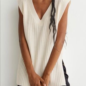 cream sweater vest with slits